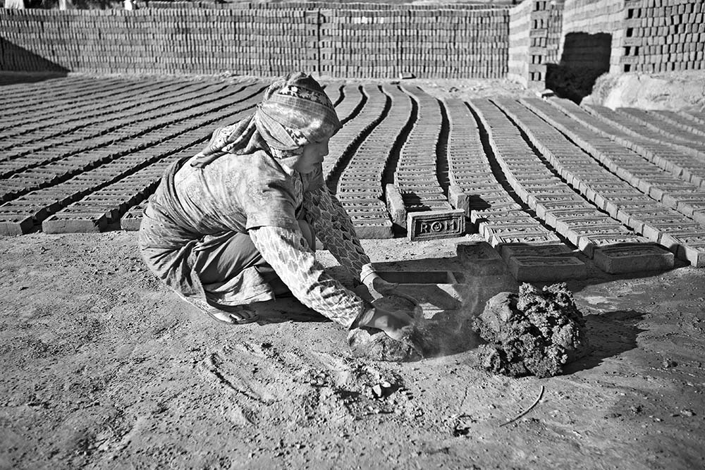 lady laborer in a brickyard